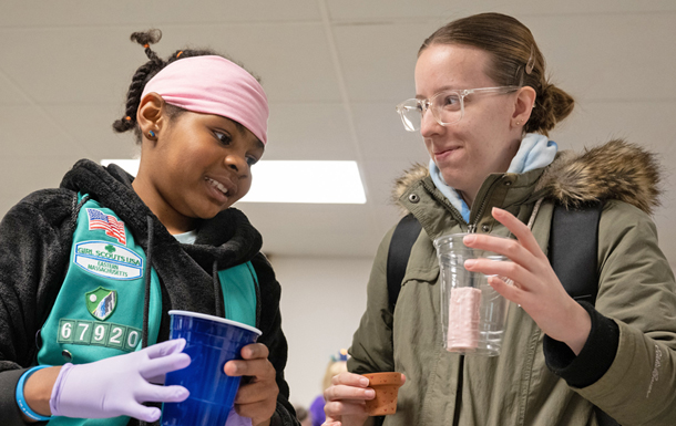 ©Melissa Ostrow - Girl Scout and Volunteer conducting a science experiment